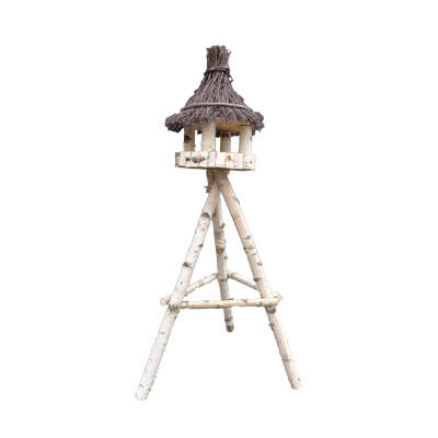 Wooden bird feeder on a birch stand